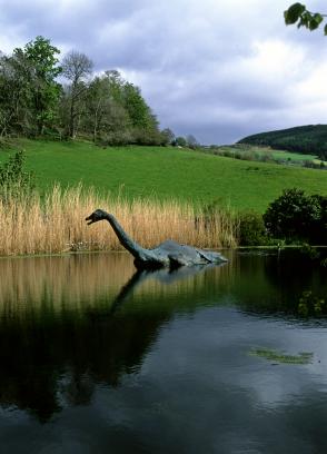 artists depiction of loch ness monster in lake